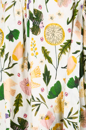 Product shot of the Frill of Birds Cotton Wrap Dress - Birdfleur in colour Birdfleur, showing detail