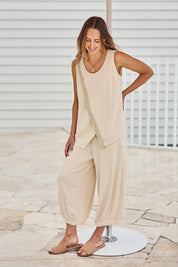 Model Tegand wearing size 10 of the Summer Daze Linen Blend Knit Tank – Sand in colour Sand, from the front