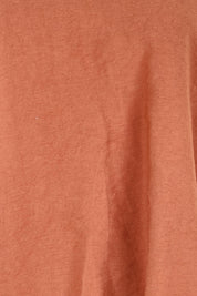 Product shot of the Sun Gazer Balloon Sleeve Top – Rust in colour Rust, showing detail