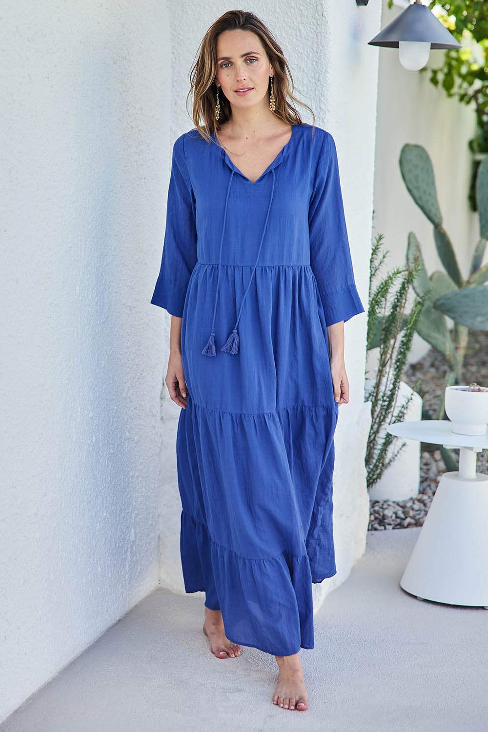 Model Tegand wearing size 10 of the Summer Sun Cotton Maxi Dress – Cornflower in colour Cornflower, from the front