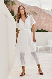 Model Tegand wearing size 10 of the Wear Your Own Way Maxi Dress – White in colour White, from the front