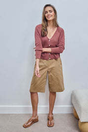 Model Tegand wearing size 10 of the Want You In My Life Long Line Shorts – Camel in colour Camel, from the front