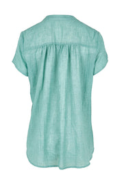 Product shot of the Pleated Delight Cotton Blouse – Mint in colour Mint, from the back