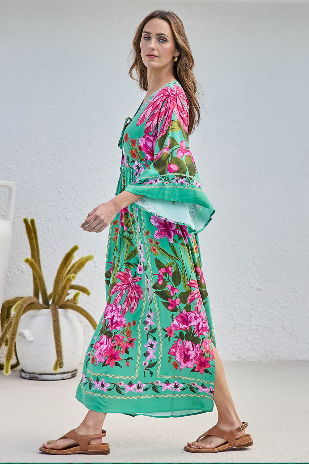 Model Tegand wearing size 10 of the Wild Meadow Maxi Dress - Greenfleur in colour Greenfleur, from the front