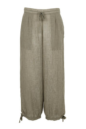 Product shot of the Floating Through The Day Pants  - Olive in colour Olive, from the front