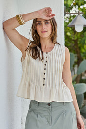 Model Tegand wearing size 10 of the Out Of Office Woven Cotton Pleated Tank - Sand in colour Sand, in a cropped view