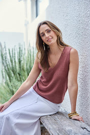 Model Tegand wearing size 10 of the Golden Hour Knit Tank - Rosewood in colour Rosewood, from an angle