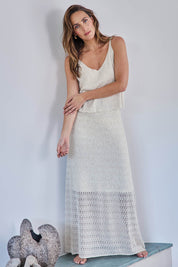 Model Tegand wearing size 10 of the Golden Hour Knit Skirt - Natural in colour Natural, from the front