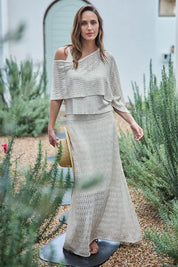 Model Tegand wearing size 10 of the Golden Hour Knit Skirt - Natural in colour Natural, from the front