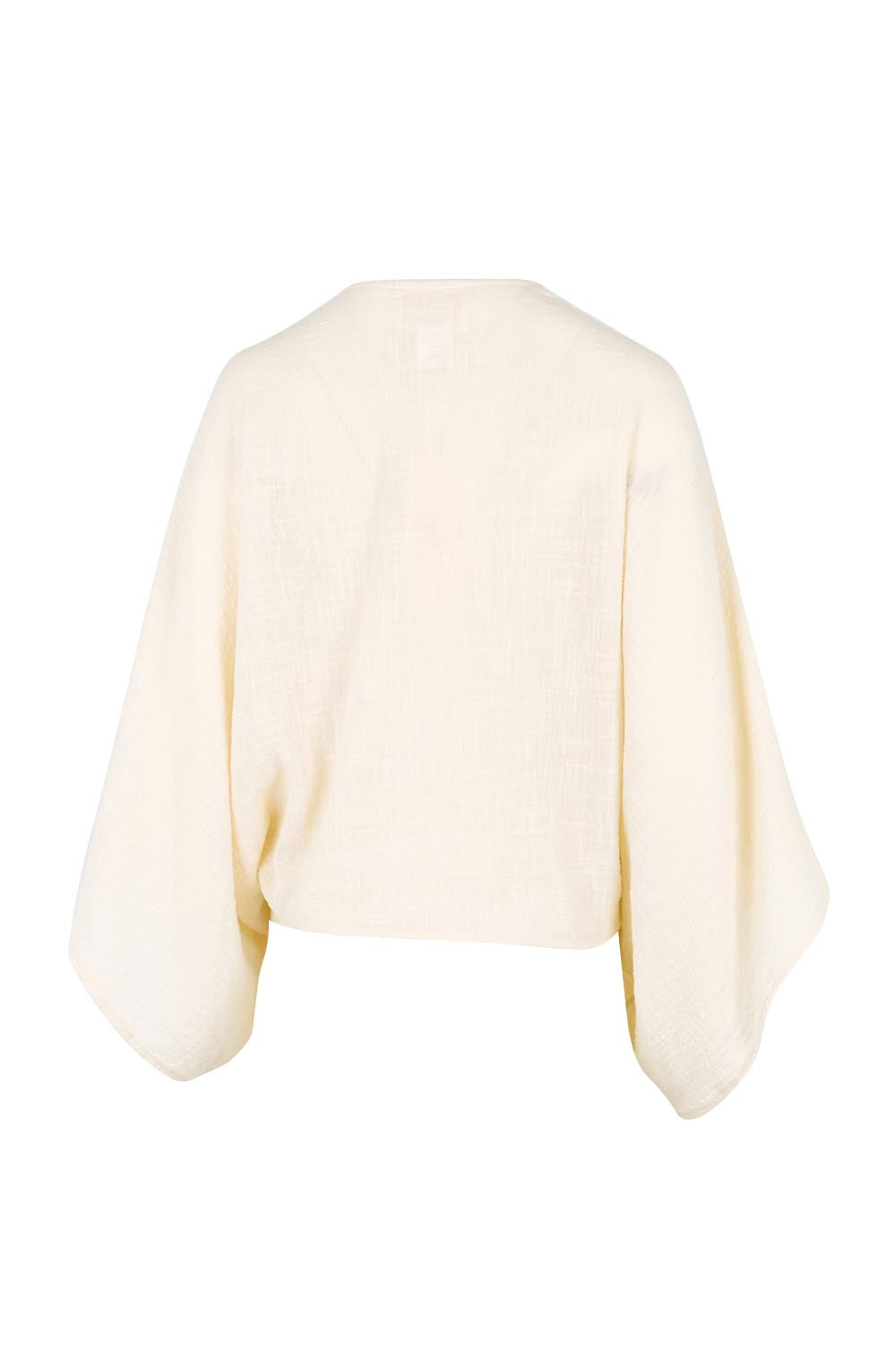 Product shot of the Out Of Office Woven Cotton Shrug  - Sand in colour Sand, from the back