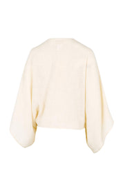 Product shot of the Out Of Office Woven Cotton Shrug  - Sand in colour Sand, from the back