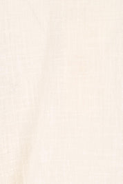 Product shot of the Out Of Office Woven Cotton Shrug  - Sand in colour Sand, showing detail