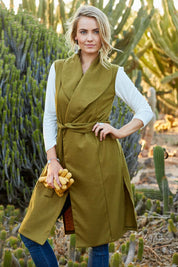 Model Marnee wearing size 8 of the Round Em Up Vest in colour Forest (Green), from the front, showing the whole outfit