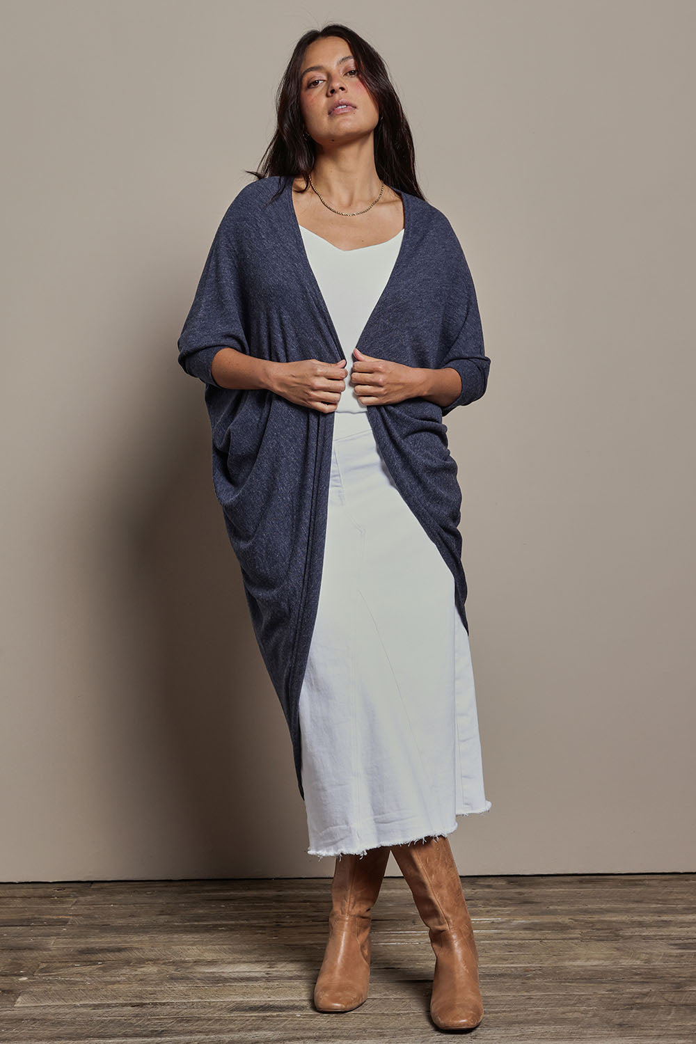 Model Tahnee wearing size 10 of the Falling For You Cardi in colour Denim (Blue), from the front, showing the whole outfit
