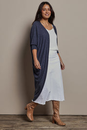 Model Tahnee wearing size 10 of the Falling For You Cardi in colour Denim (Blue), from the front, showing the whole outfit