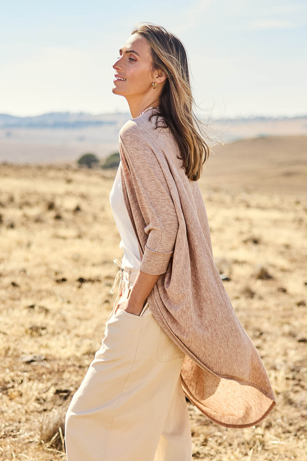 Model Courtney wearing size 10 of the Falling For You Cardi in colour Natural, from the front, showing the whole outfit
