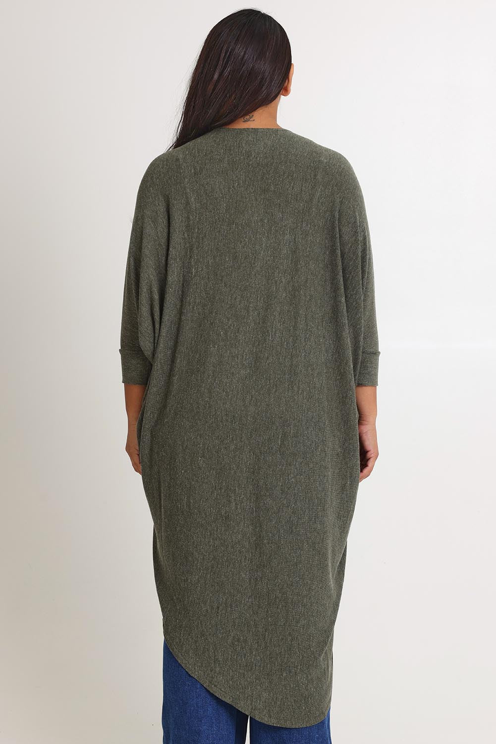Model Ashleigh wearing size 16 of the Falling For You Cardi in colour Pine (Green), from the back