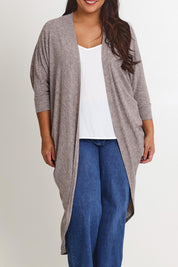 Model Ashleigh wearing size 16 of the Falling For You Cardi in colour Rock, from the front, cropped image