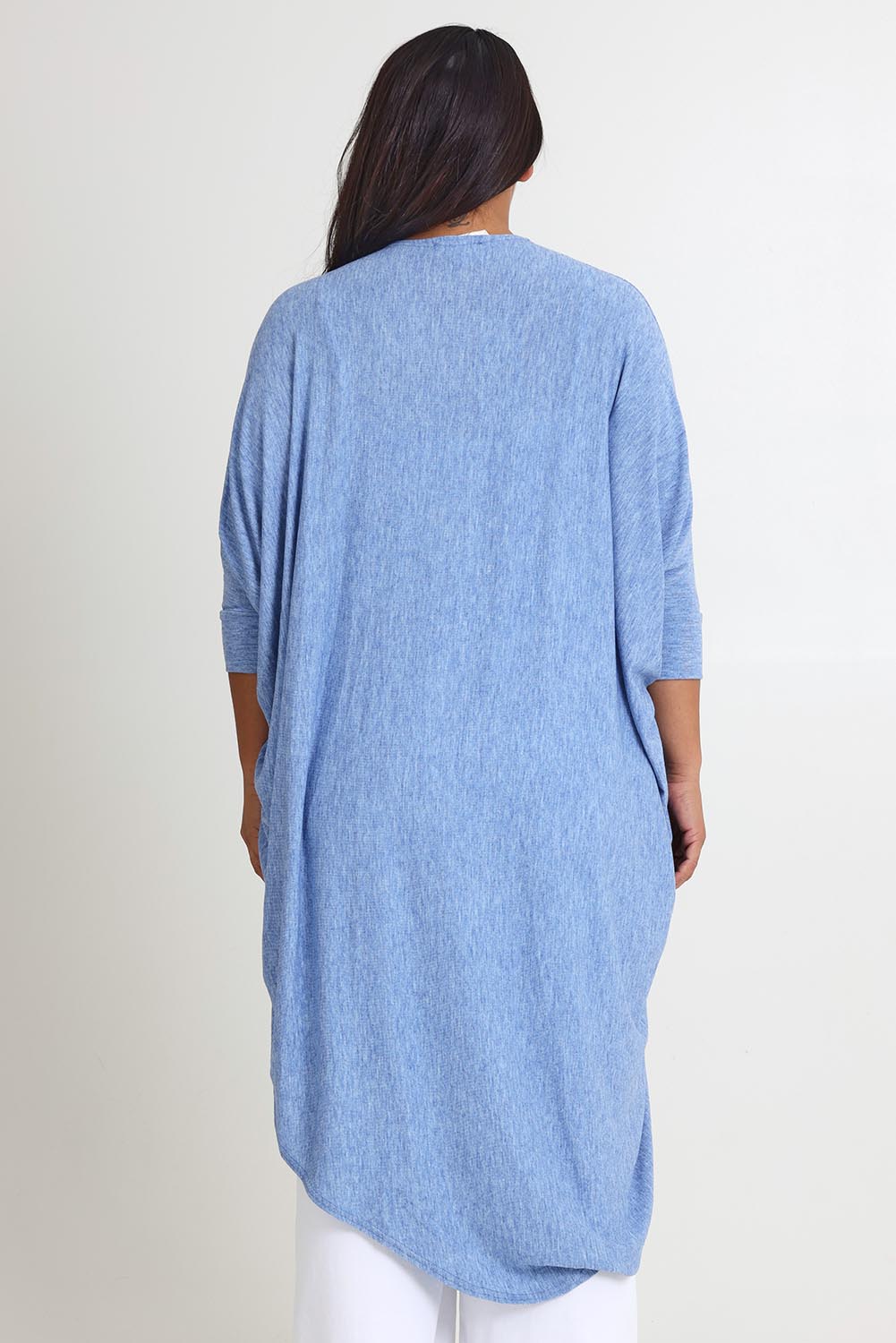 Model Ashleigh wearing size 10 of the Falling For You Cardi in colour Sky (Blue), from the back