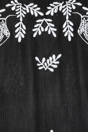 Product shot of the Dancing With Birds Midi Dress in colour Black (Black), detail