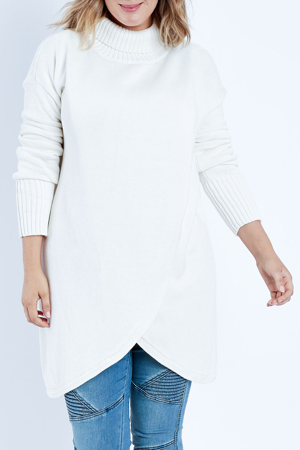 Model Jess wearing size L of the Crossing The Plains Cotton Sweater in colour Snow (White), from the front, cropped image