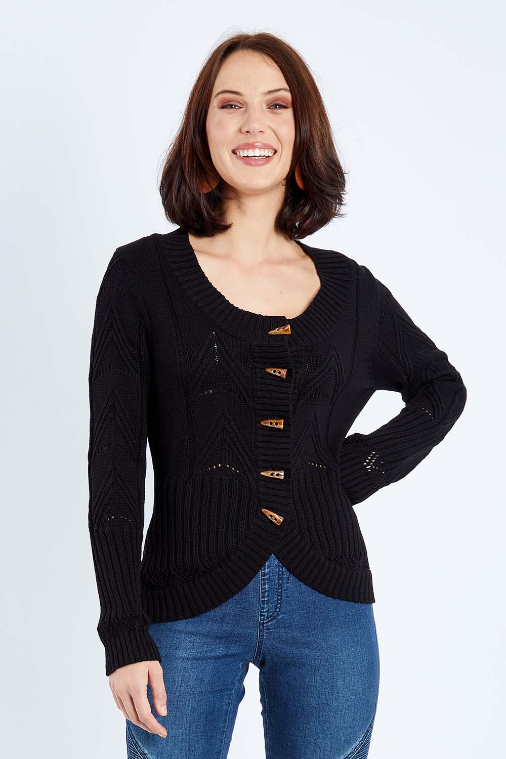 Model Andrea wearing size S of the Fireside Button Cardigan in colour Black (Black), from the front, cropped image