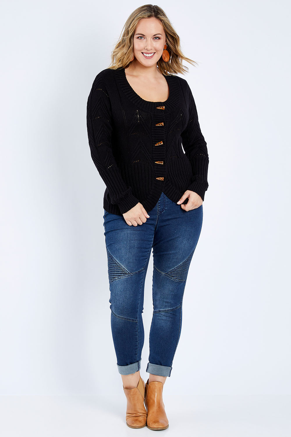 Model Jess wearing size L of the Fireside Button Cardigan in colour Black (Black), from the front, showing the whole outfit