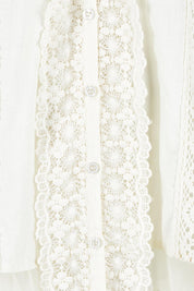 Product shot of the Whispers In The Dark Shirt in colour Milk (White), detail