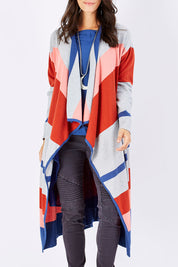 Model Georgia wearing size S of the Tribal Colours Cardigan in colour Rainbow (Grey), from the front, cropped image