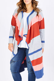 Model Laura wearing size M of the Tribal Colours Cardigan in colour Rainbow (Grey), from the front, cropped image