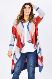 Model Laura wearing size M of the Tribal Colours Cardigan in colour Rainbow (Grey), from the front, cropped image