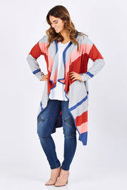 Model Laura wearing size M of the Tribal Colours Cardigan in colour Rainbow (Grey), from the front, showing the whole outfit
