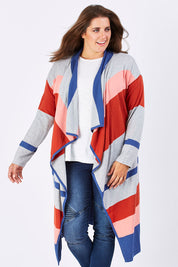 Model Mae wearing size XL of the Tribal Colours Cardigan in colour Rainbow (Grey), from the front, cropped image