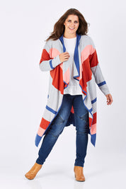 Model Mae wearing size XL of the Tribal Colours Cardigan in colour Rainbow (Grey), from the front, showing the whole outfit