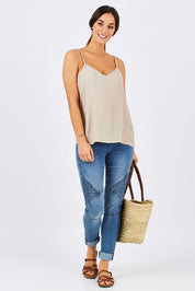 Model Georgia wearing size 10 of the Runaway Top in colour Sand, from the front, showing the whole outfit