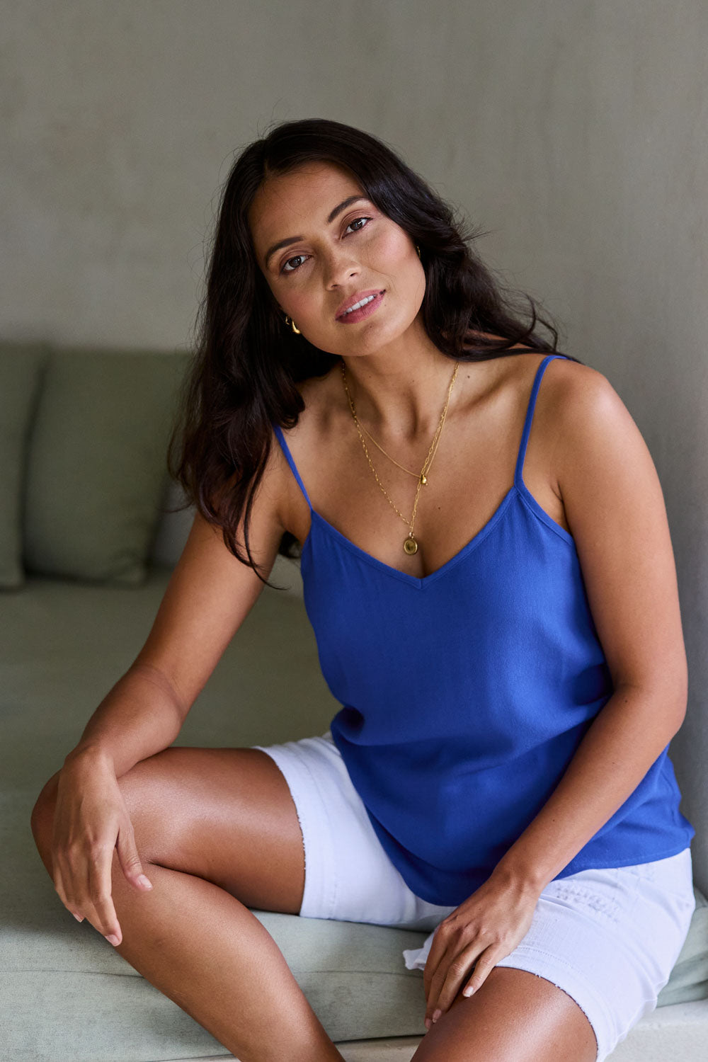 Model Tahnee wearing size 10 of the Runaway Top in colour Ultramarin (Blue), from the front, showing the whole outfit