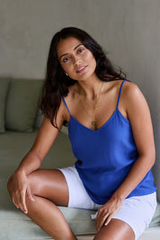 Model Tahnee wearing size 10 of the Runaway Top in colour Ultramarin (Blue), from the front, showing the whole outfit