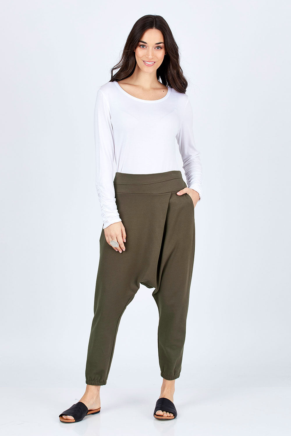 Model Georgia wearing size 10 of the Relax With Me Pants in colour Olive (Green), from the front, showing the whole outfit