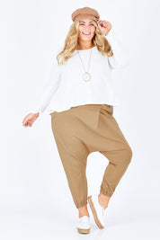Model Sophie wearing size 18 of the Relax With Me Pants in colour Tobacco, from the front, showing the whole outfit