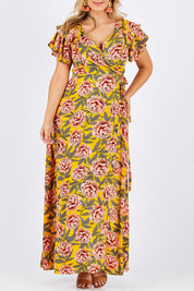 Model Jess wearing size 12 of the Bellezza Maxi Dress in colour Sunset, from the front, cropped image