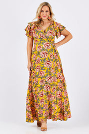 Model Jess wearing size 12 of the Bellezza Maxi Dress in colour Sunset, from the front, showing the whole outfit