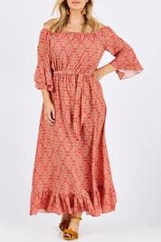 Model Jess wearing size 12 of the In Light Of The Sun Maxi in colour Red (Red), from the front, cropped image