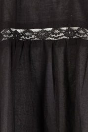 Product shot of the Spring Day Cotton Throw in colour Black (Black), detail