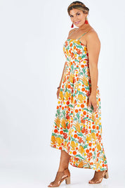 Model Palatina wearing size 14 of the Dancing By Sunset Dress in colour Floralspot, from the front, showing the whole outfit
