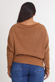 Model Ashleigh wearing size 16 of the Snuggle Up Jumper in colour Coffee, from the back