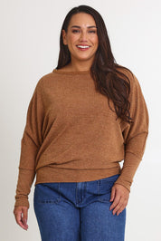 Model Ashleigh wearing size 16 of the Snuggle Up Jumper in colour Coffee, from the front, cropped image