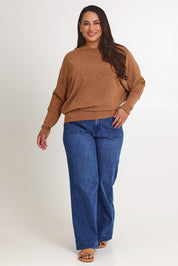 Model Ashleigh wearing size 16 of the Snuggle Up Jumper in colour Coffee, from the front, showing the whole outfit