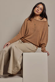 Model Tahnee wearing size 10 of the Snuggle Up Jumper in colour Coffee, from the front, showing the whole outfit
