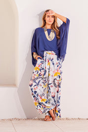 Model Marnee wearing size 10 of the Flowers For Me Pants in colour Flowerfall (Blue), from the front, showing the whole outfit