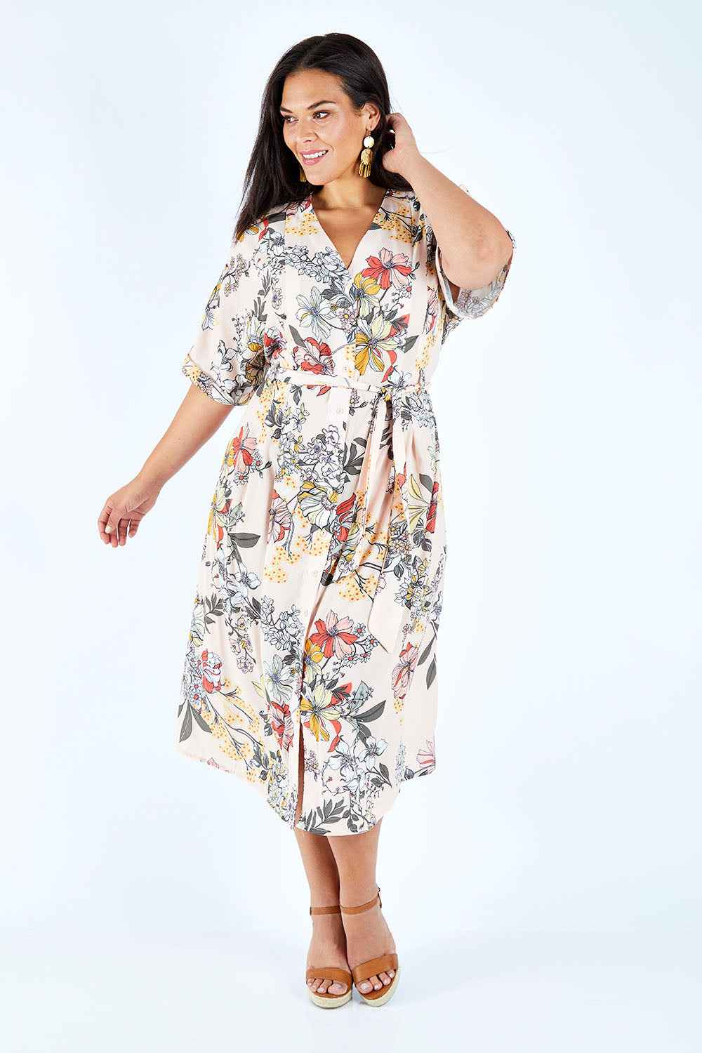 Model Lauren wearing size 18 of the Floating Through The Day Dress in colour Blush (Pink), from the front, showing the whole outfit